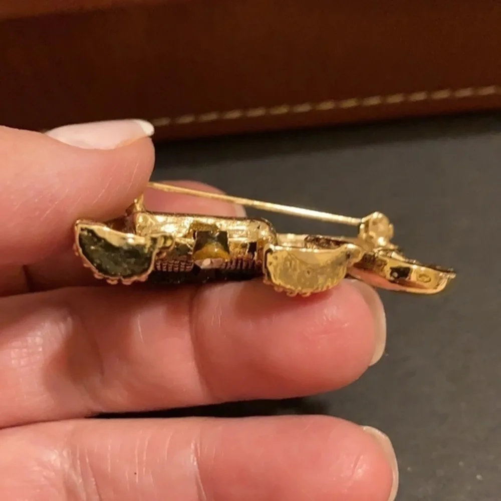 Gorgeous gold tone and crystal elephant brooch